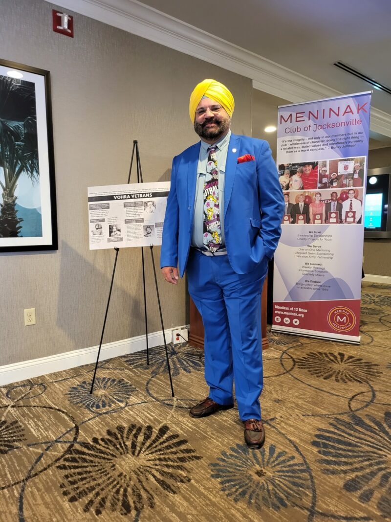 Lakhinder poses at Meninak Foundation honor